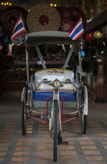 Fototapeta na wymiar Three wheeled bike / Bike for the transport of passengers in Thailand and in Asia