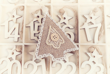 24 Days till Christmas vintage style wood calendar with festive tree on wooden background,Christmas...