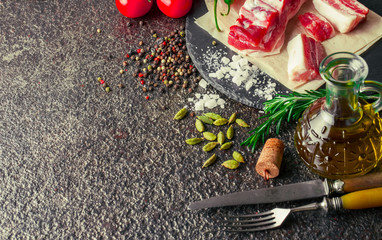 Raw meat on the old background