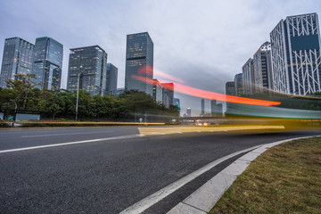 Obraz premium urban city road with motion bus at dusk, china