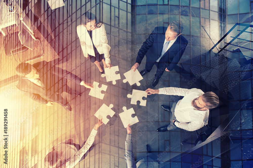 Poster teamwork of partners. concept of integration and startup with puzzle pieces