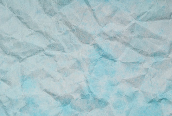 Texture of blue crumpled paper