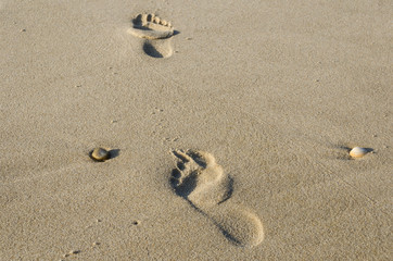 Fußspuren am Strand