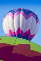 Obraz premium Pink Blue and White Hot Air Balloon