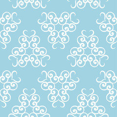 White flowers on blue background. Ornamental seamless pattern