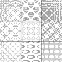 Light gray geometric ornaments. Collection of seamless patterns