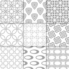 Light gray geometric ornaments. Collection of seamless patterns