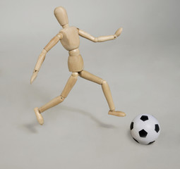 a puppet with a soccer ball