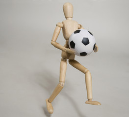 a puppet with a soccer ball
