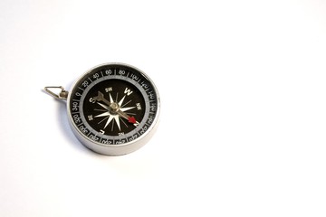 Old compass on a white background./Vintage compass On white background for various study or travel.