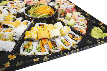 Box of fresh Sushi roll from salmon in assortment on white background