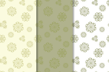 Olive green set of floral ornaments. Seamless patterns
