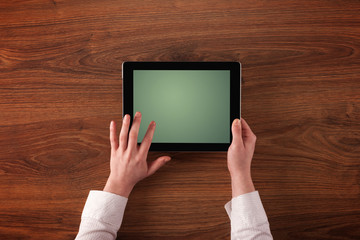 Business hands holding tablet