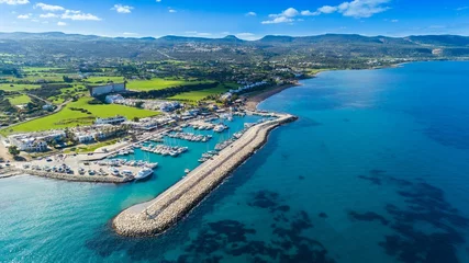 Washable wall murals Cyprus Aerial bird's eye view of Latchi port,Akamas peninsula,Polis Chrysochous,Paphos,Cyprus. The Latsi harbour with boats and yachts, fish restaurant, promenade, beach tourist area and mountains from above
