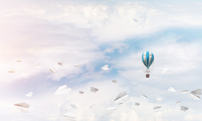 Flying hot air balloon in the air.