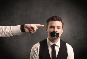 Business hand pointing at employee