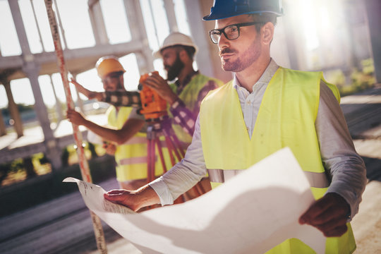 Picture Of Construction Engineer Working On Building Site