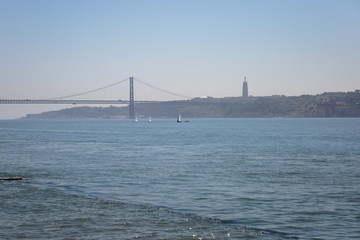 25th April Bridge in Lisbon and Sailing Boats, Portugal