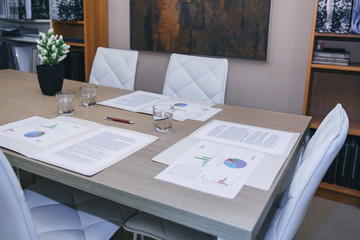 Desktop with graph and diagrams ready to meeting in headquarters 