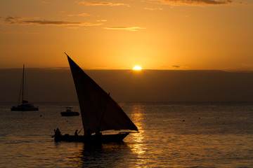 the beautiful beach and sea of zanzibar during the sunset in the indian ocean