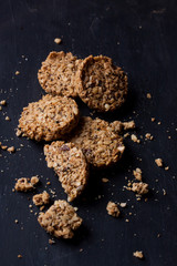Homemade granola bar on a black background