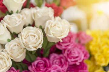 The  fabric hand made white and red roses .