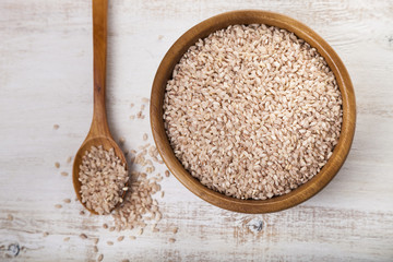 Raw pink rice in a bowl