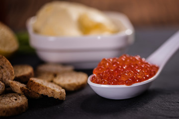 Fototapeta na wymiar detail close up of red caviar fish egg salmon roe 
