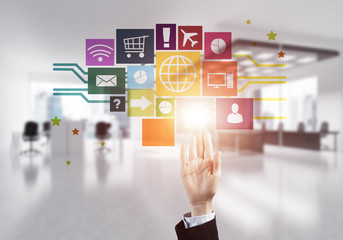 Modern office interior and close of businesswoman hand choosing 