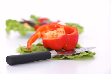 salad from fresh vegetables in a plate on a table, selective focus