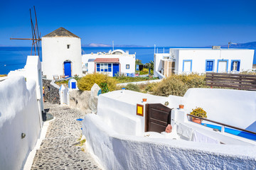 Oia village in Santorini, Greece - Windmill blue sky