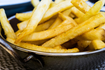 Golden French fries potatoes ready to be eaten