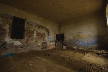 Fototapeta na wymiar Dark and abandoned interior of a power plant