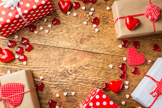 Top view of various gift boxes on wooden table