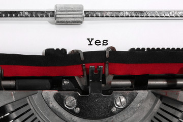Text YES written with the old typewriter