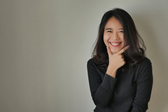portrait of happy smiling young asian woman