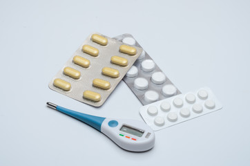 Medicines with a thermometer, tablets against viral diseases