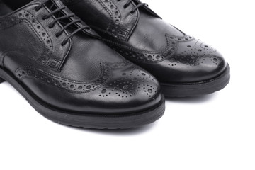 Black brogues. Isolated on a white background.