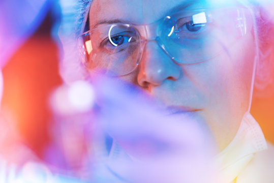 Medical science researcher performing test in laboratory