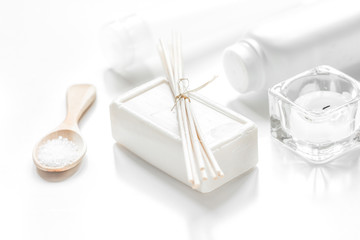 body care concept with white set of cosmetics woman desk top vie