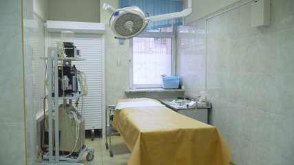 Operating room with medical equipment in a veterinary clinic. Table for surgical operations in the hospital.