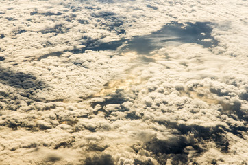 cloudy sunset seen from above, from the airplane