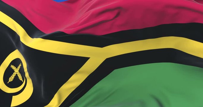 Flag of Vanuatu waving at wind in slow with blue sky, loop