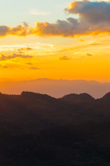 Fototapeta na wymiar Sunset on the top of mountain colourful sky cloud