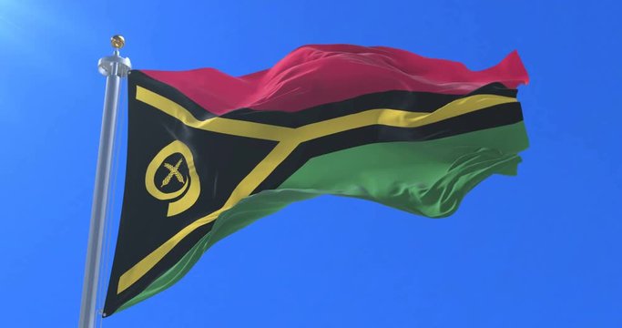 Flag of Vanuatu waving at wind in slow with blue sky, loop