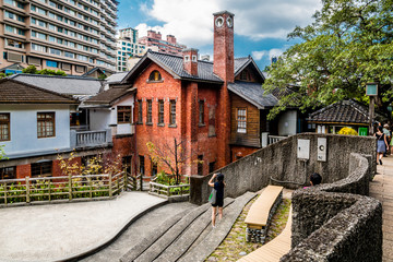 A tourist is taking a photo of the Beitou Hot Spring Museum in Taipei, Taiwan which was initially...
