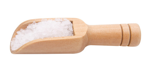 Sea salt in wooden scoop isolated on white background