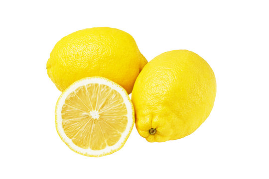 Two whole yellow ripe lemon fruit and one round slice, isolated on a white background, top view