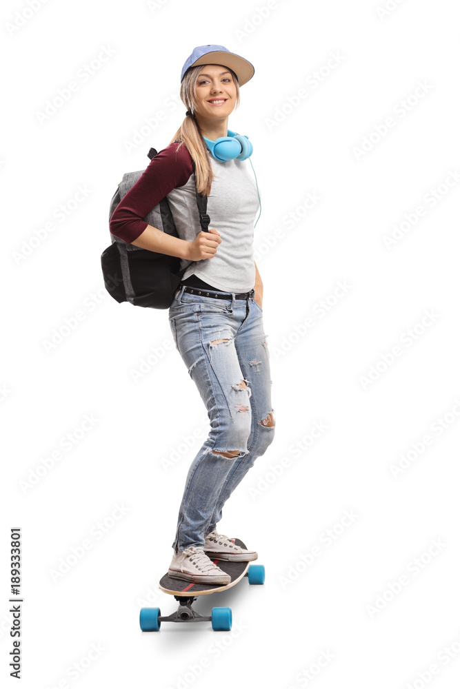 Poster female skater with a backpack riding a longboard