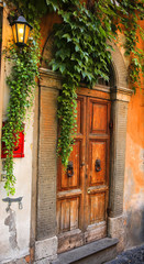 Fototapeta na wymiar Old italian vintage door